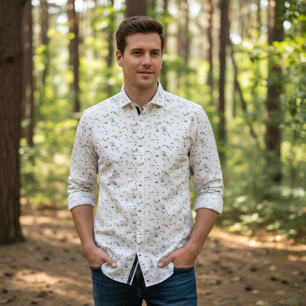 Long sleeve modern-fit shirt with allover pine tree and mountain print, spread collar, and Mother of Pearl buttons, made from Egyptian cotton.