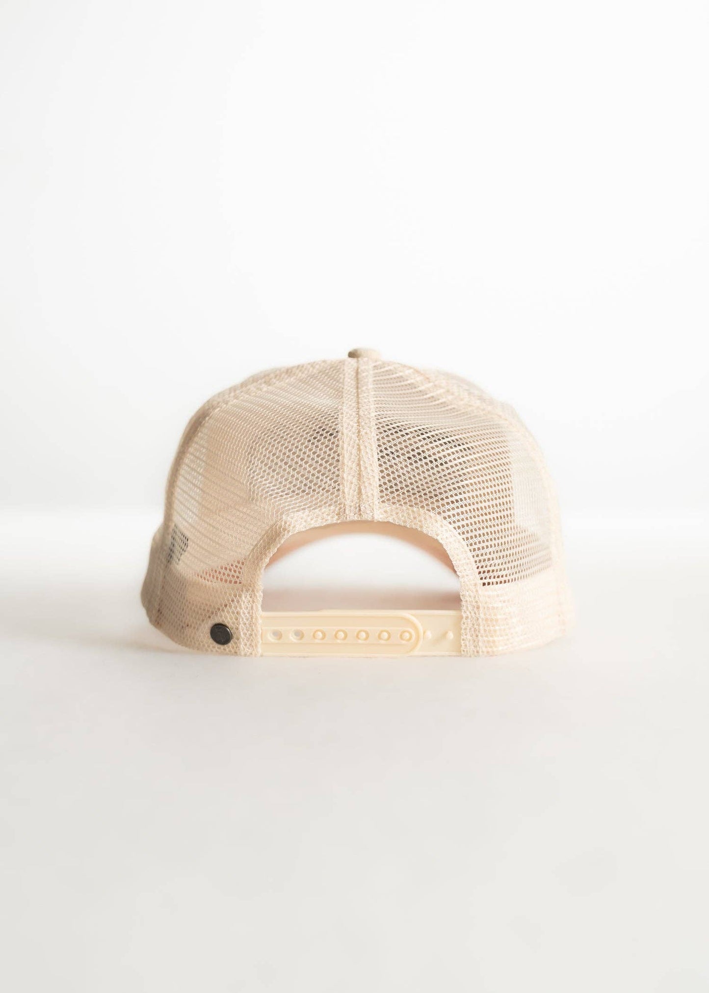 Beige mesh cap on a white background