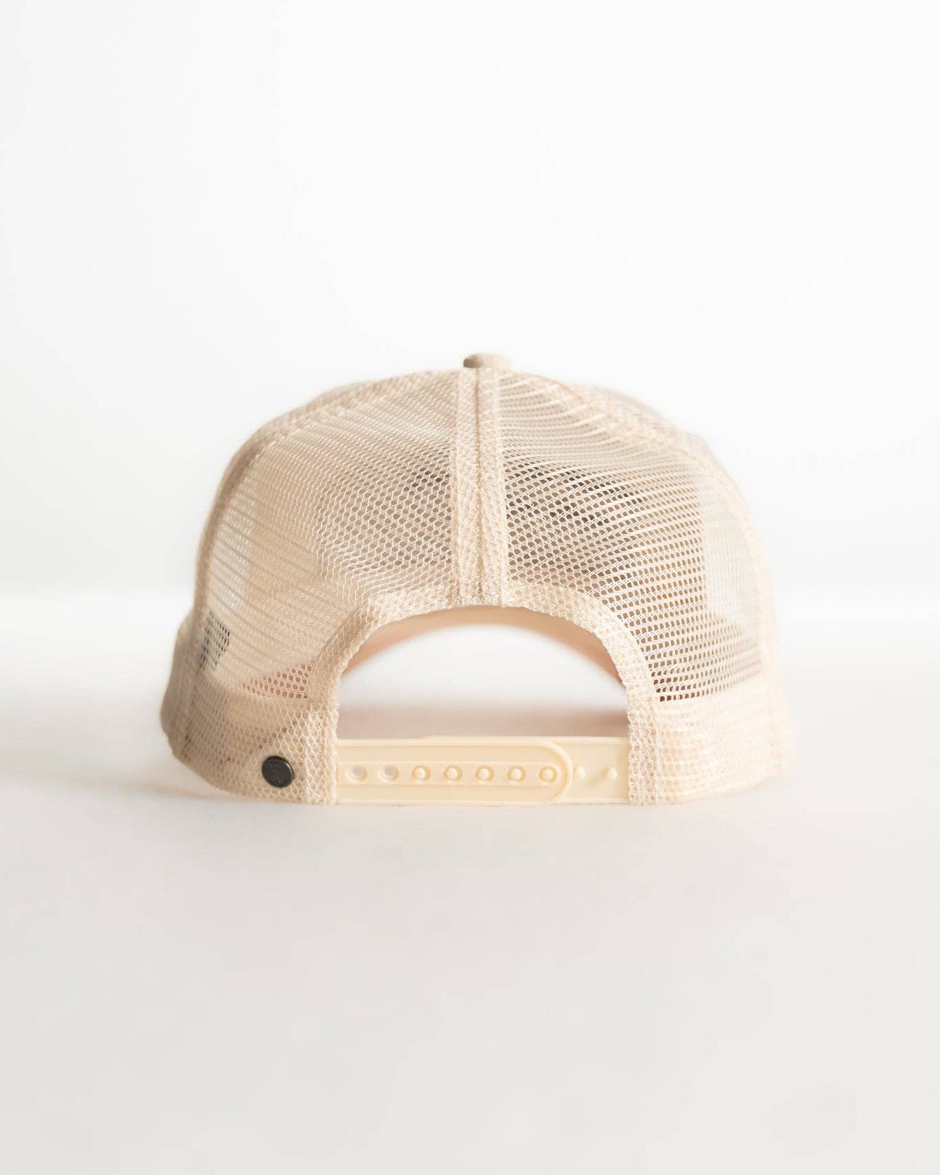 Beige mesh cap on a white background