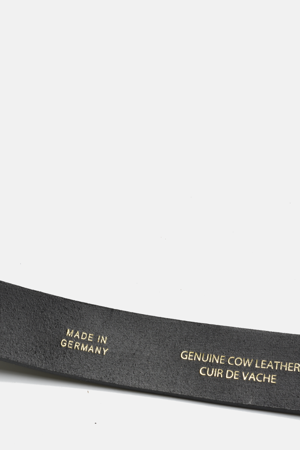 Black leather belt with gold text on a white background