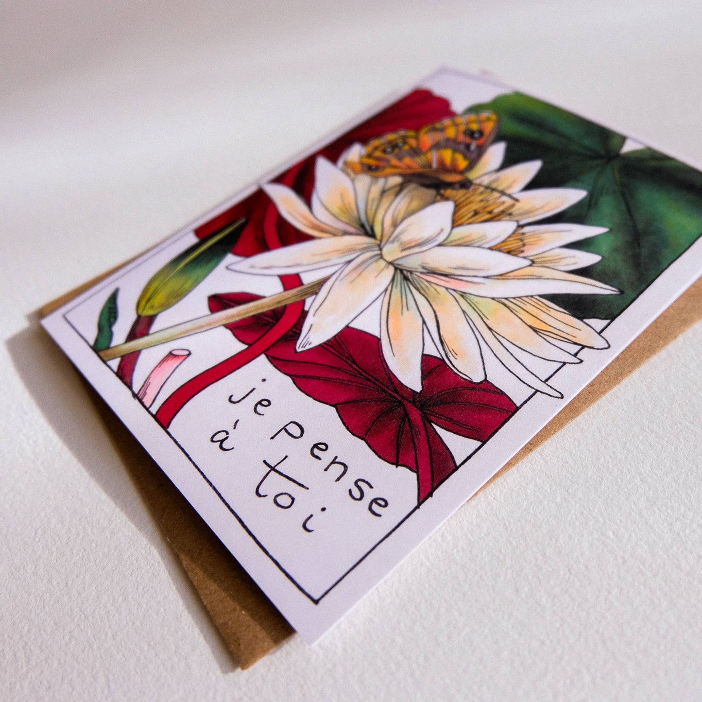Greeting card with floral design and text on a white background