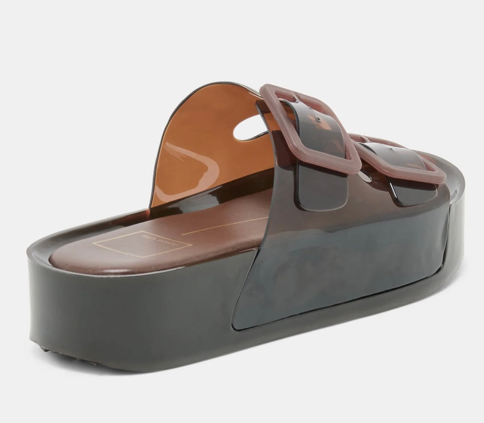 Brown sandal with a platform sole on a white background