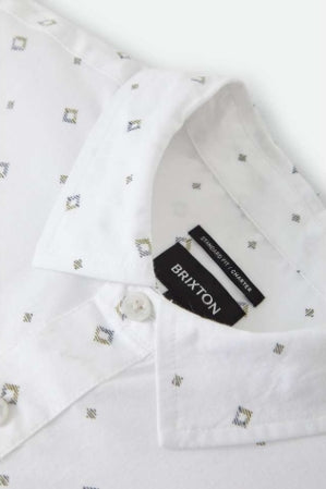 White shirt with small pattern and Brixton label on a white background