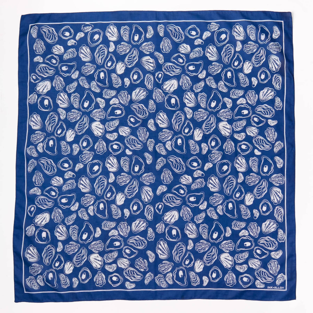 Blue square scarf with white shell pattern