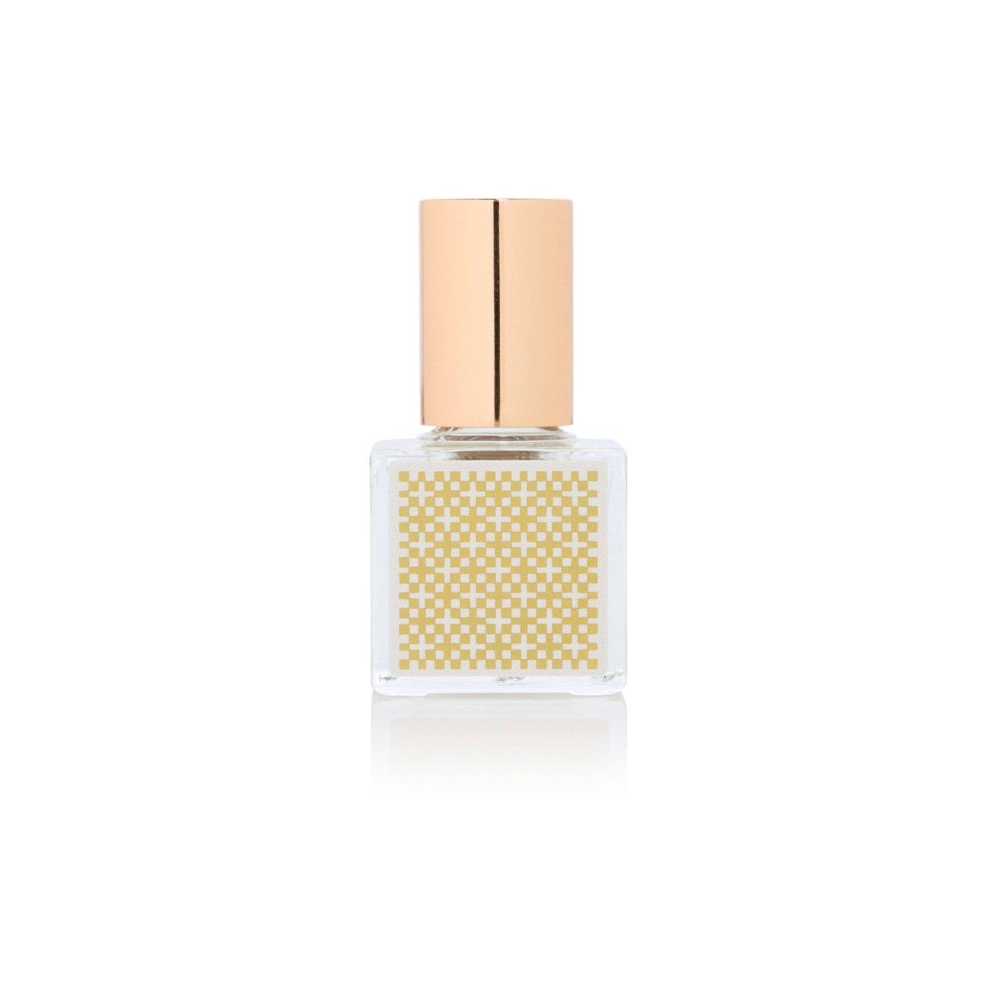 Small perfume bottle with gold cap on a white background