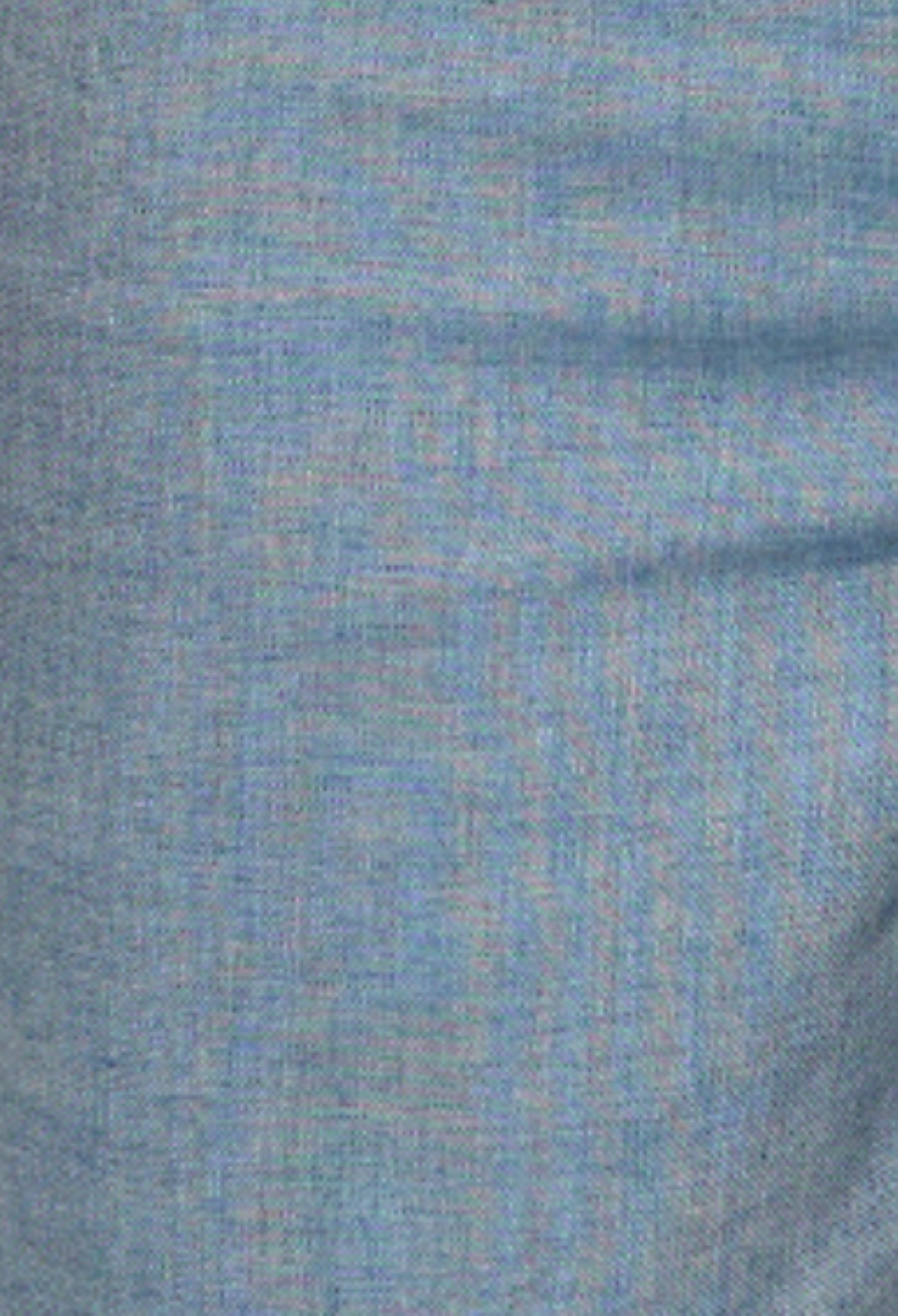 Close-up of blue fabric with a subtle pattern