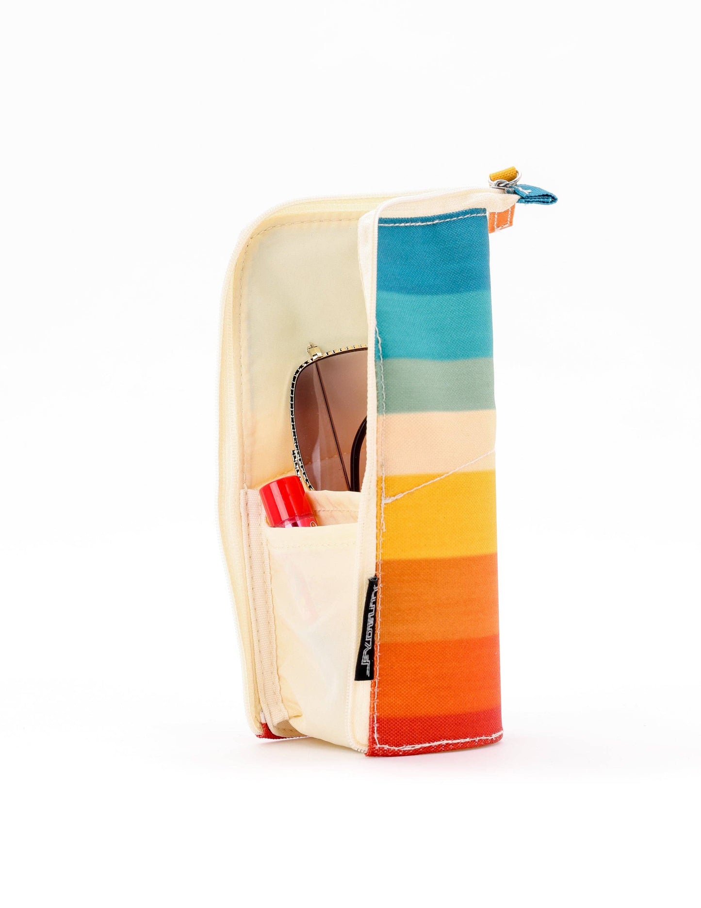 Colorful striped pouch with sunglasses on a white background