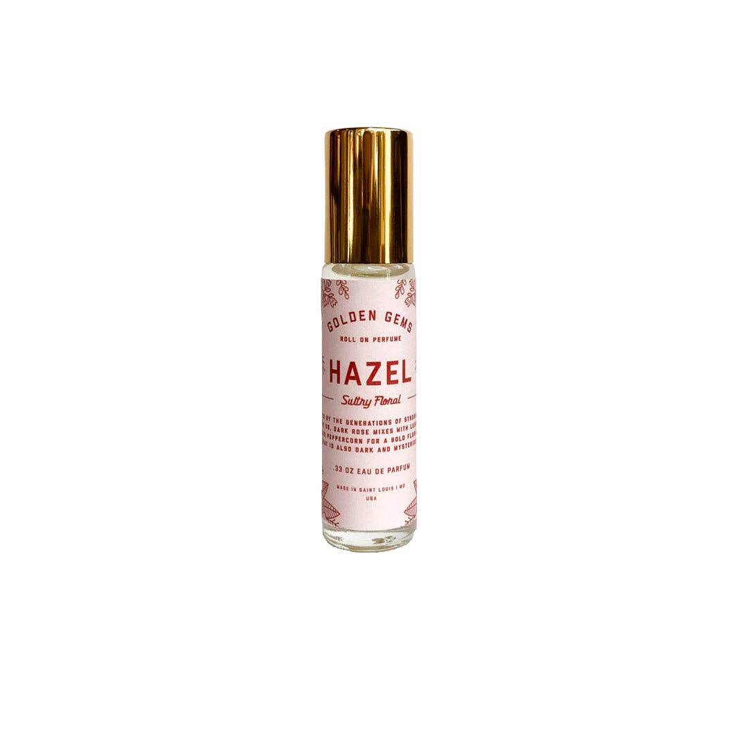 Roll-on perfume bottle labeled 'Hazel' on a white background
