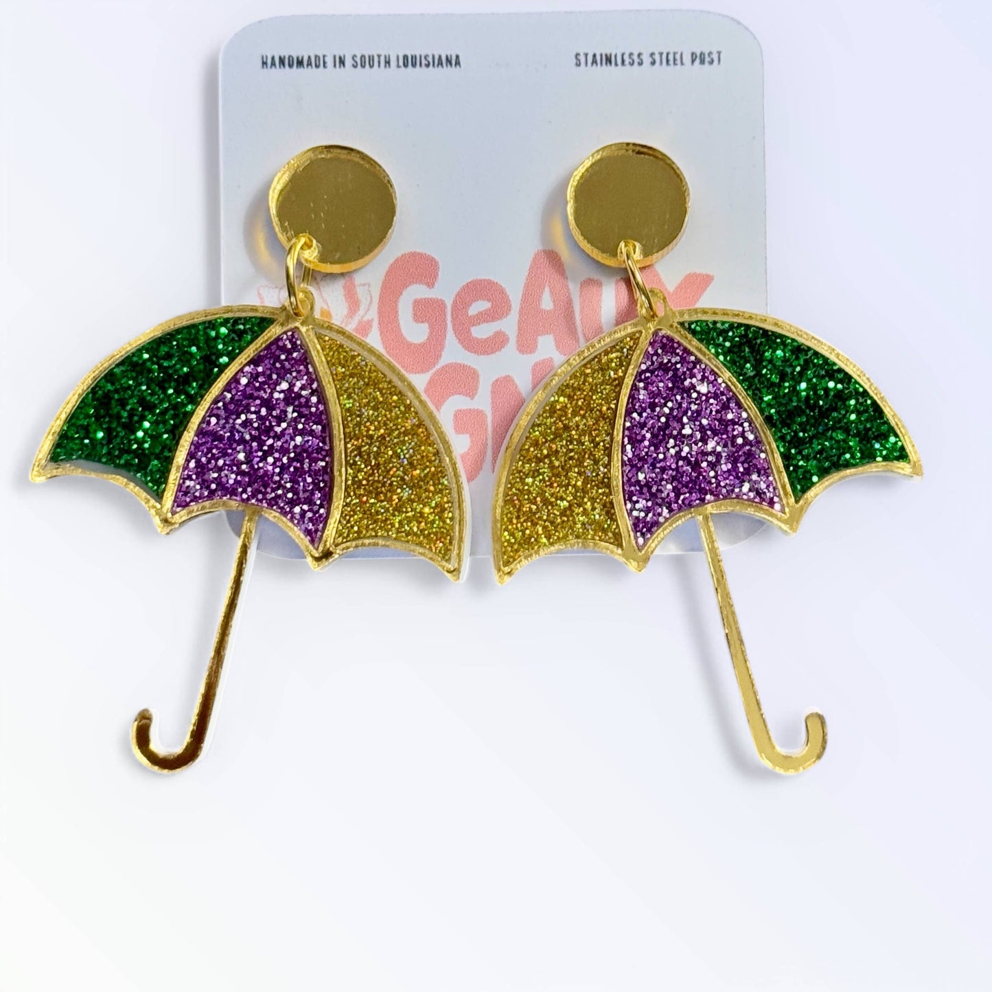 Umbrella-shaped earrings with glittery green and purple design on a card with 'Geaux Lafitte' branding.