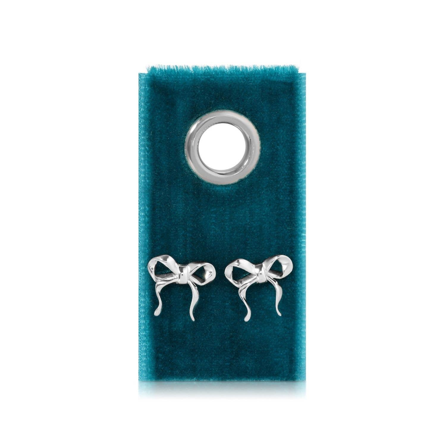 Silver bow-shaped earrings on a blue velvet card with a clear plastic cover.