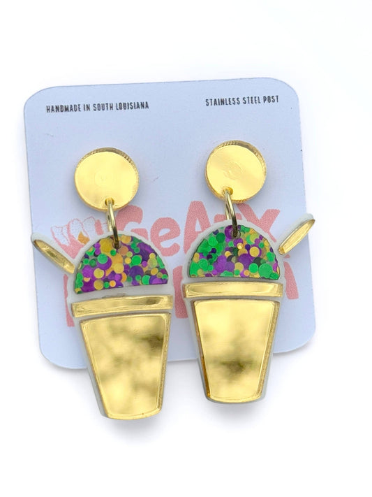 Gold bucket earrings with colorful lids on a branded card