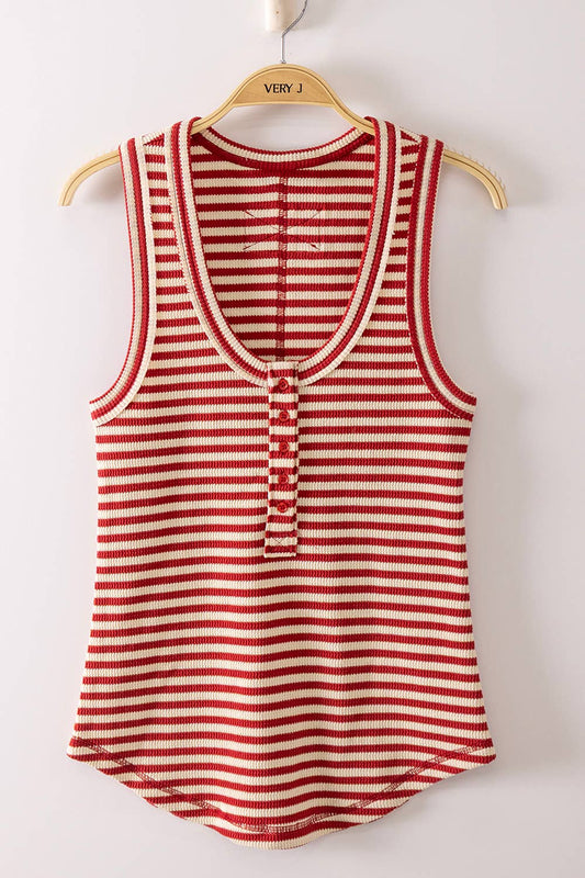 Red and white striped tank top on a hanger against a white background