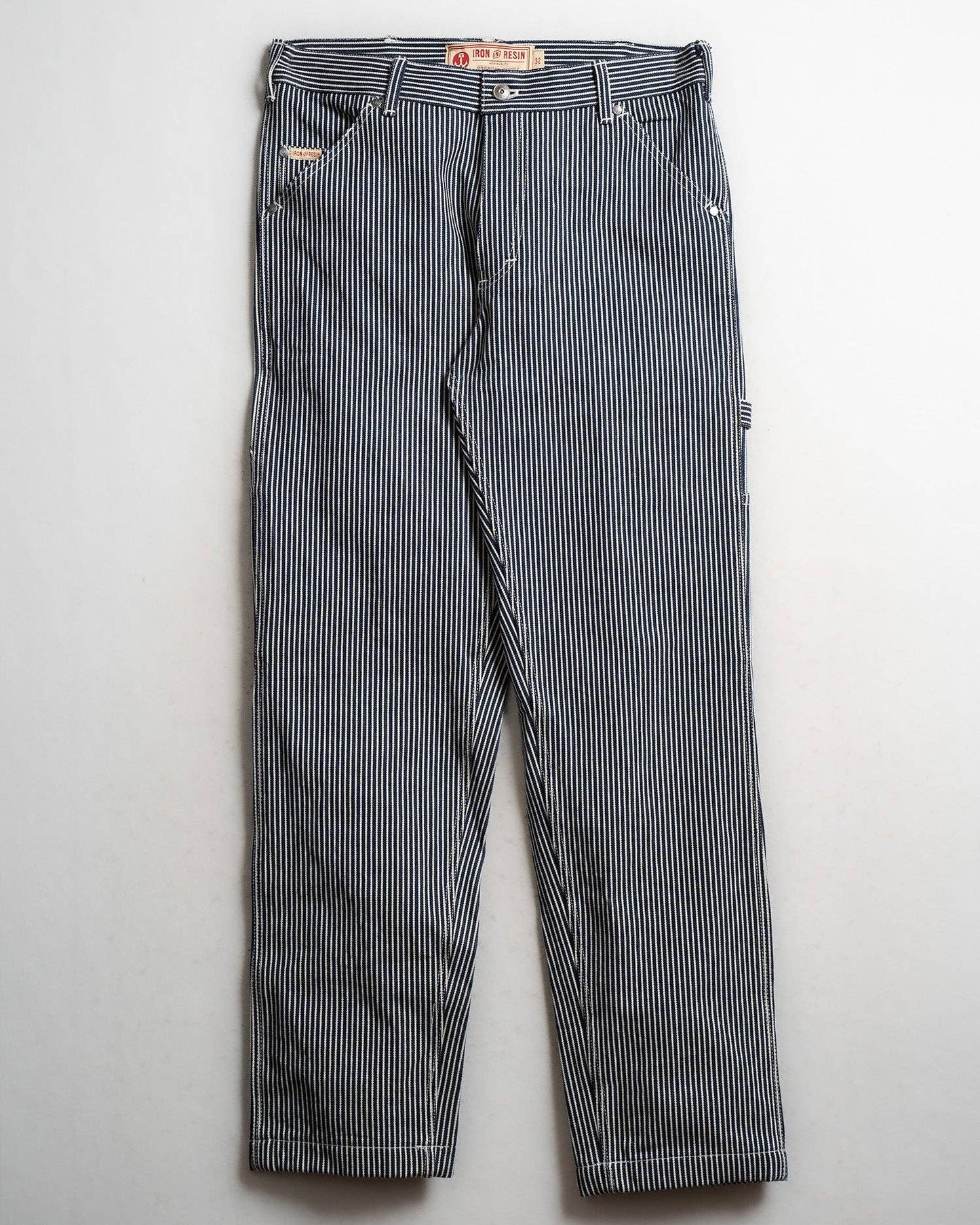 Striped pants on a light gray background