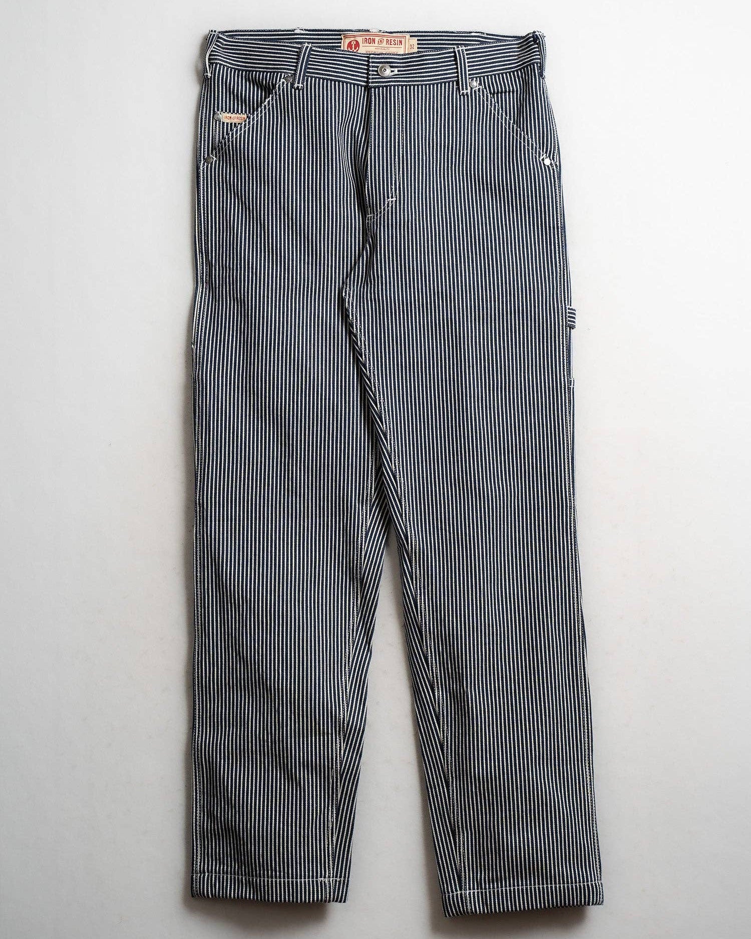 Striped pants on a light gray background