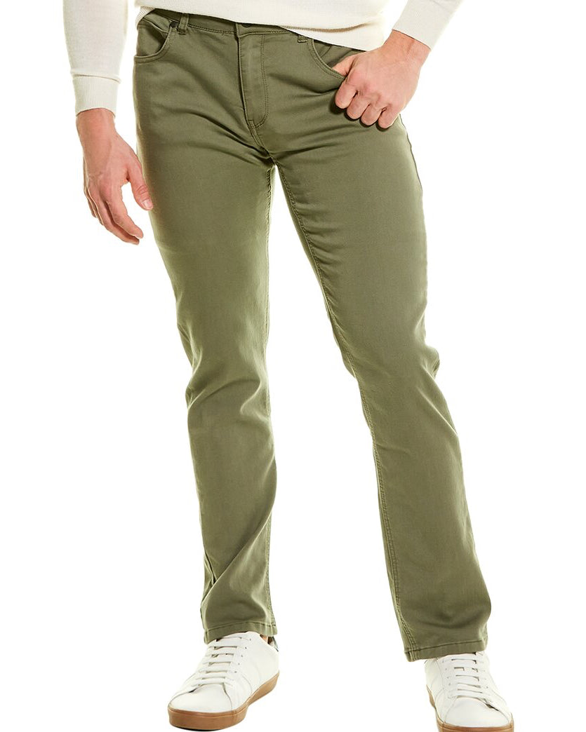 Person wearing olive green pants and white sneakers on a white background