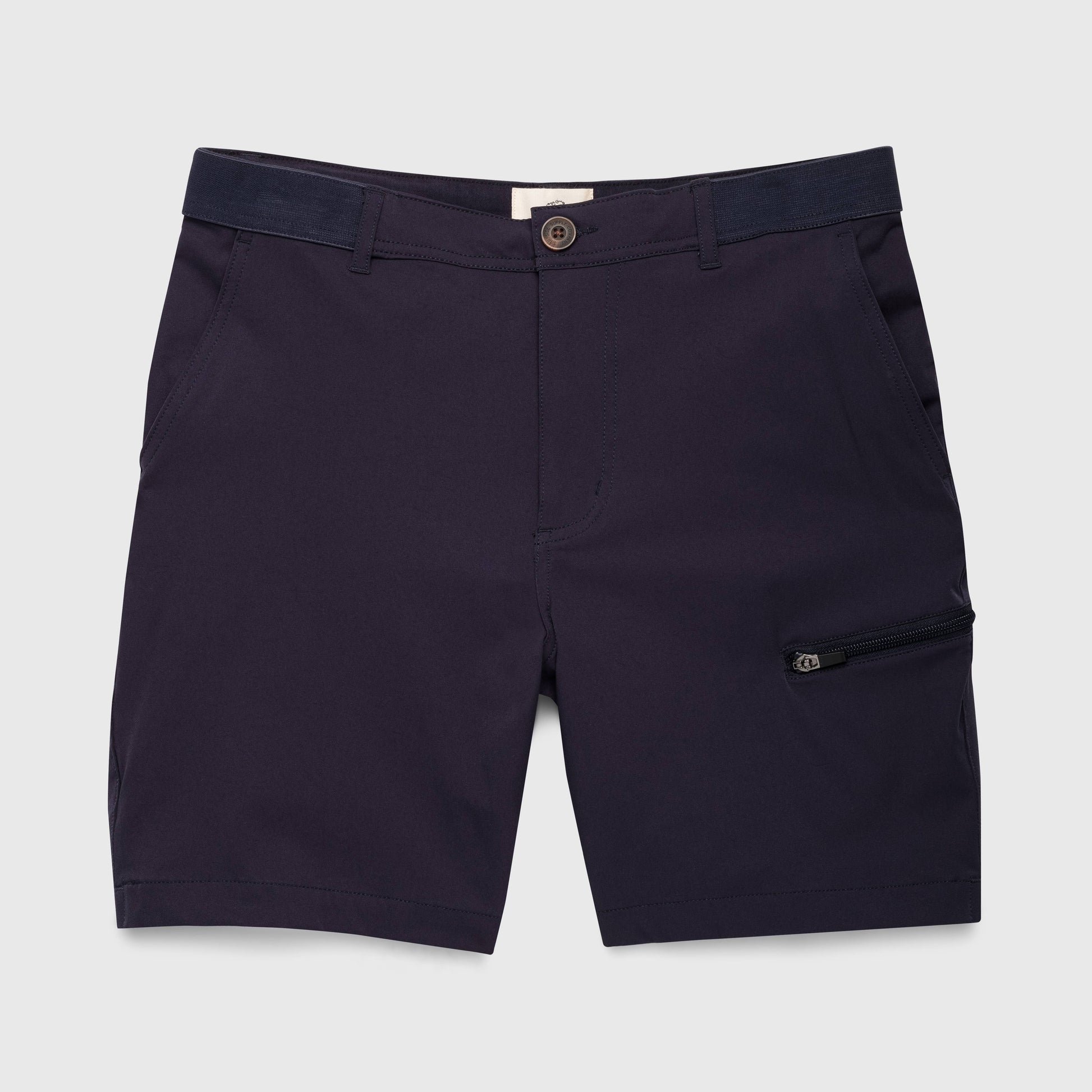 Navy blue shorts with a zipper pocket on a light gray background