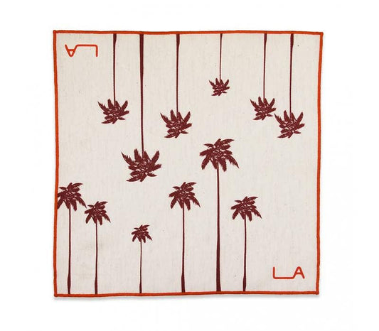 Handkerchief with red palm tree pattern and 'LA' logo on a white background