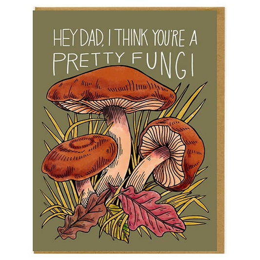 Greeting card with mushrooms and text 'Hey Dad, I think you're a pretty fungi!' on a green background