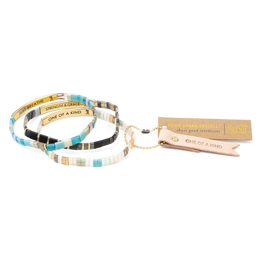Set of beaded bracelets with text on a white background