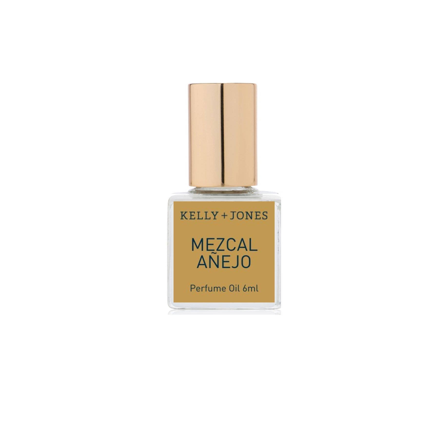 Perfume oil bottle labeled 'Mezcal Anejo' by Kelly + Jones on a white background