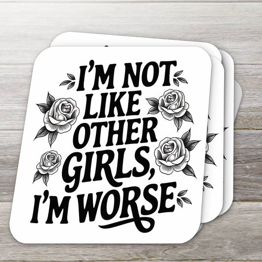 Coaster with text 'I'm not like other girls, I'm worse' and roses on a wooden surface