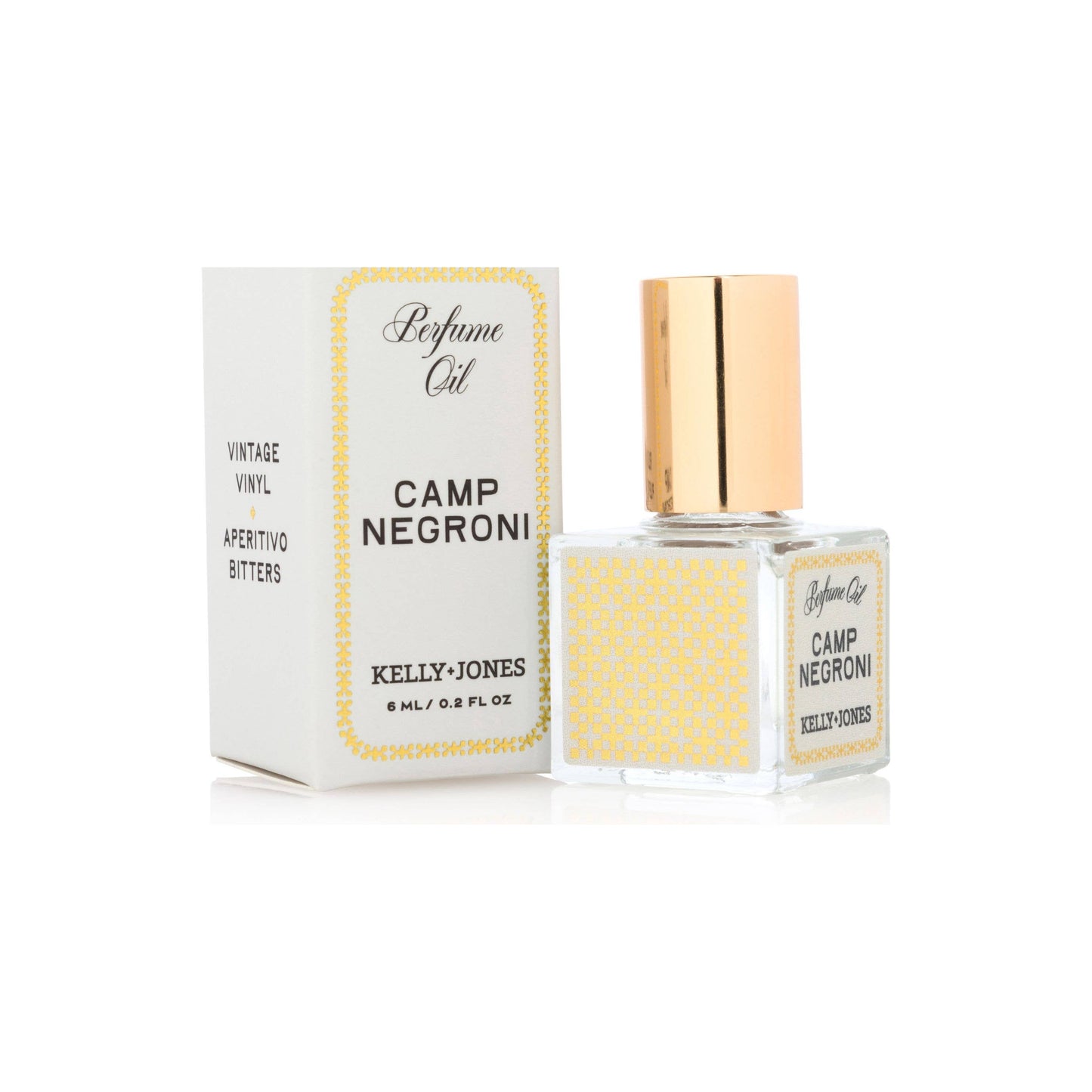 Perfume oil bottle and packaging labeled 'Camp Negroni' by Kelly Jones on a white background