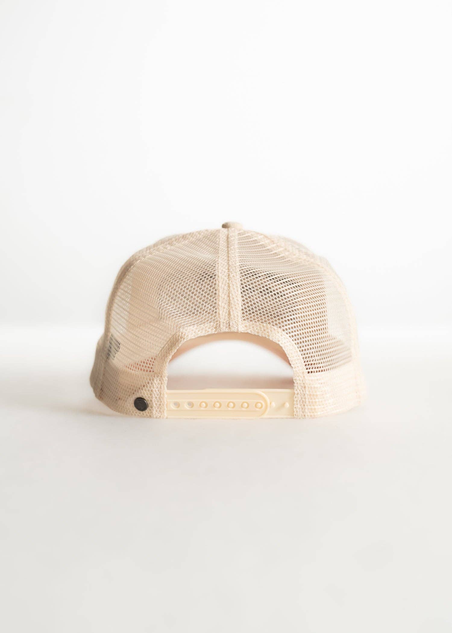 Beige mesh cap on a white background