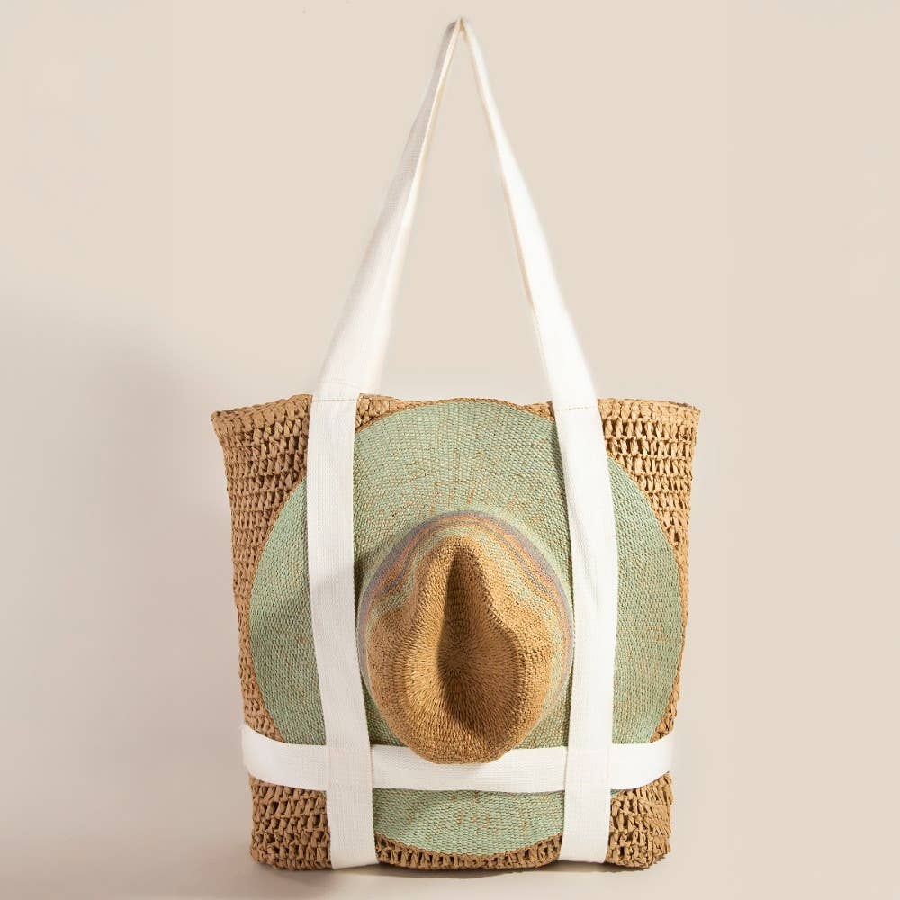 Woven tote bag with a straw hat inside on a beige background