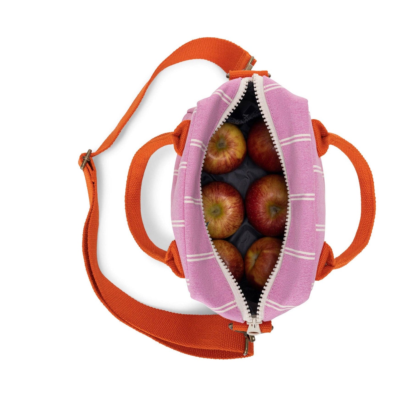 Pink bag with orange strap containing apples on a white background