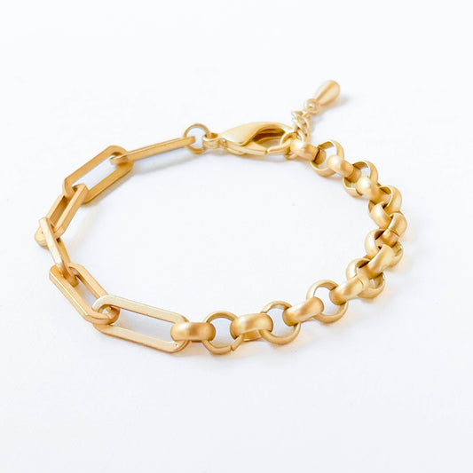 Gold chain bracelet on a white background