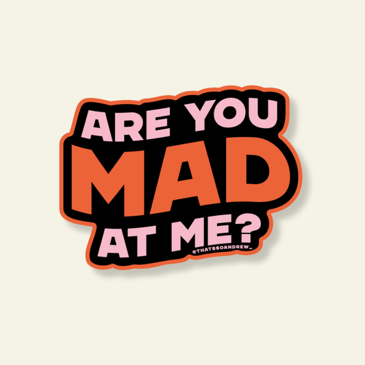 Sticker with text 'Are you mad at me?' on a beige background