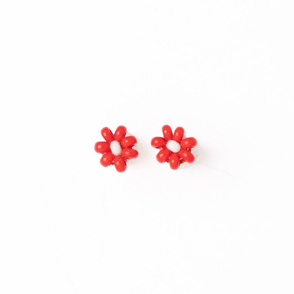 A pair of small red flower-shaped stud earrings with a white center, shown on a plain white background.