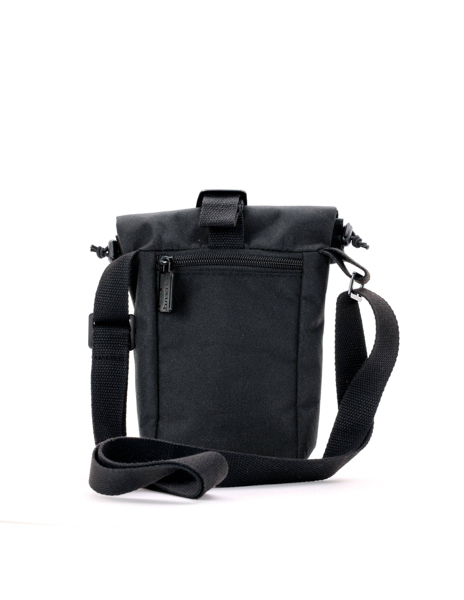 Black shoulder bag with a strap on a white background