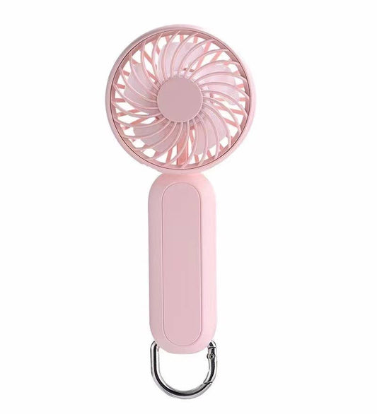 Pink handheld fan with carrying case on a white background