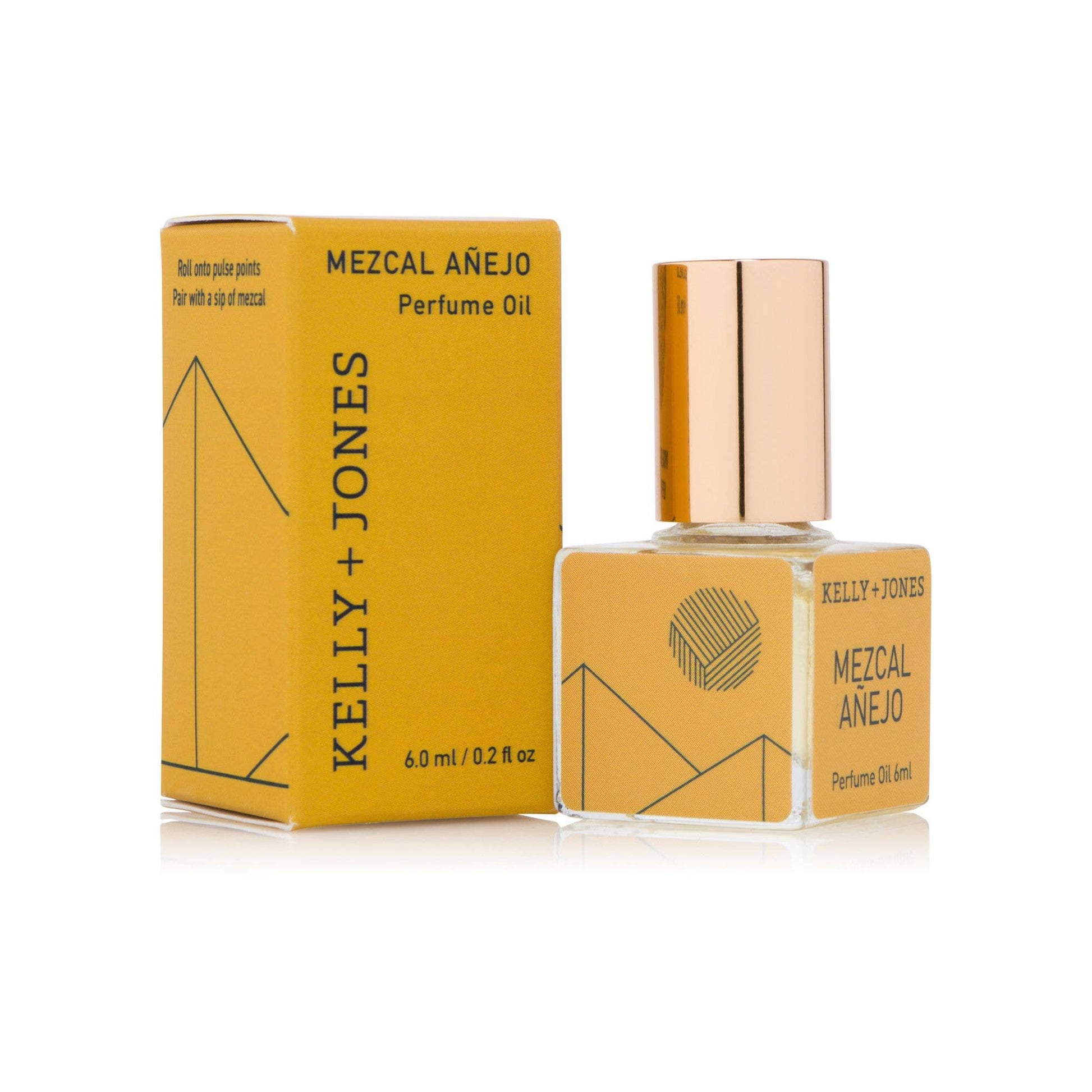 Kelly + Jones Mezcal Añejo perfume oil bottle and packaging on a white background