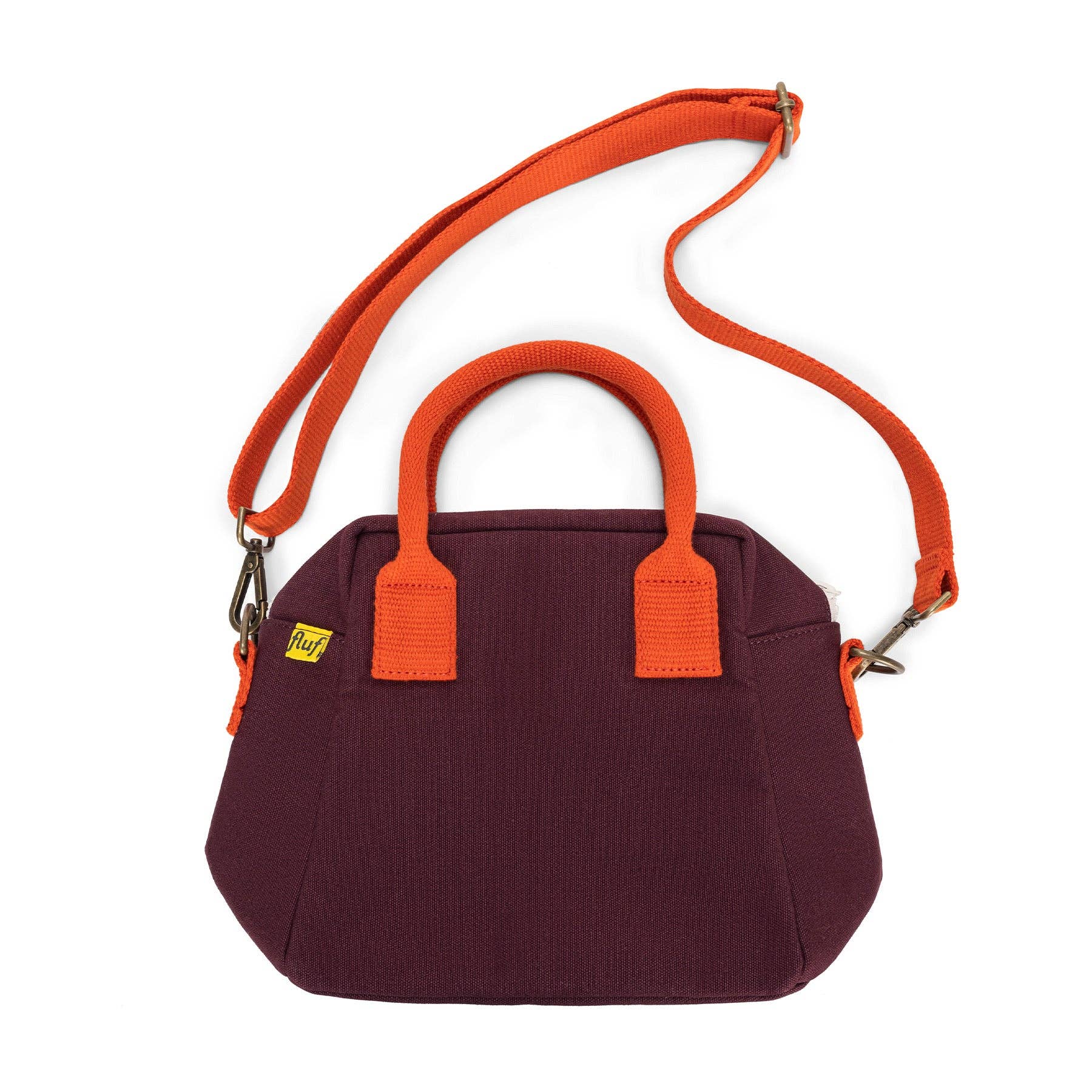 Purple handbag with orange handles and strap on a white background