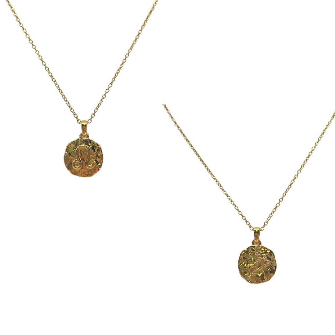 Two gold necklaces with circular pendants on a white background