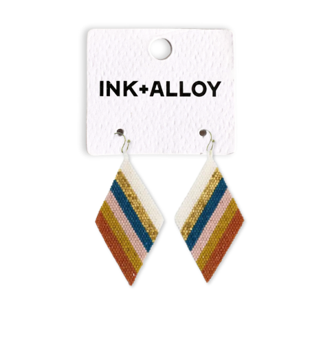 Pair of diamond-shaped earrings with striped pattern on a 'INK+ALLOY' branded card.