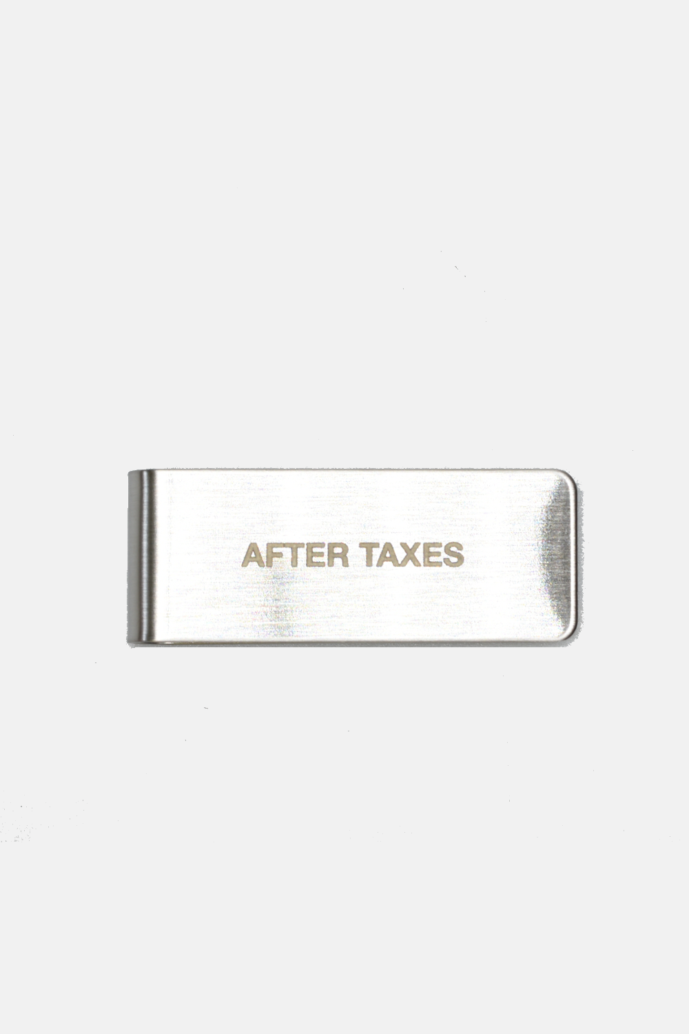 Metallic money clip with 'AFTER TAXES' text on a white background