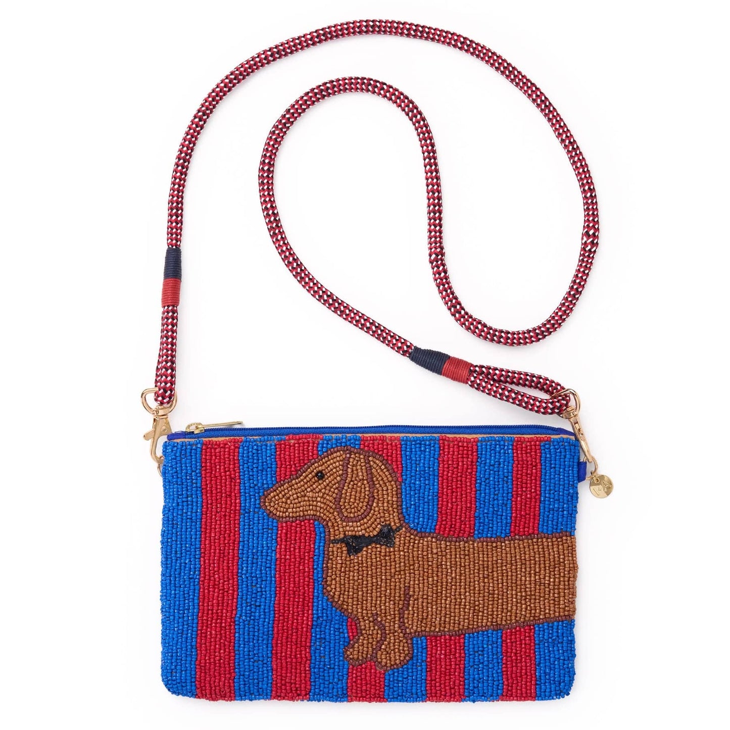 A beaded crossbody bag featuring a brown dachshund design on a background of vertical red and blue stripes, with a matching red and blue beaded strap and gold-tone hardware.