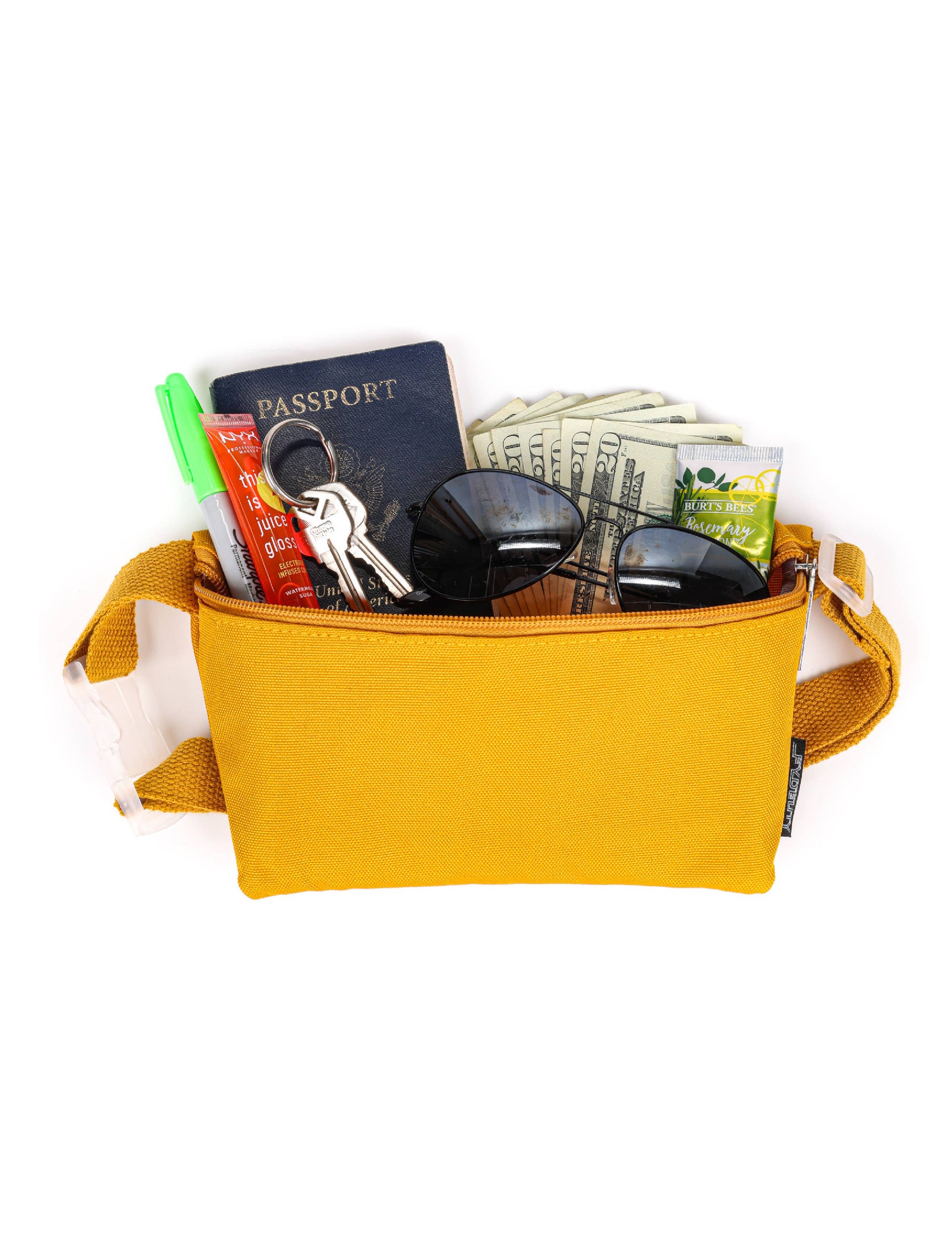 Yellow travel organizer with items including a passport, money, sunglasses, and markers.