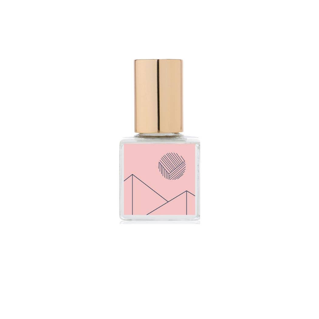 Small bottle with a gold cap on a white background