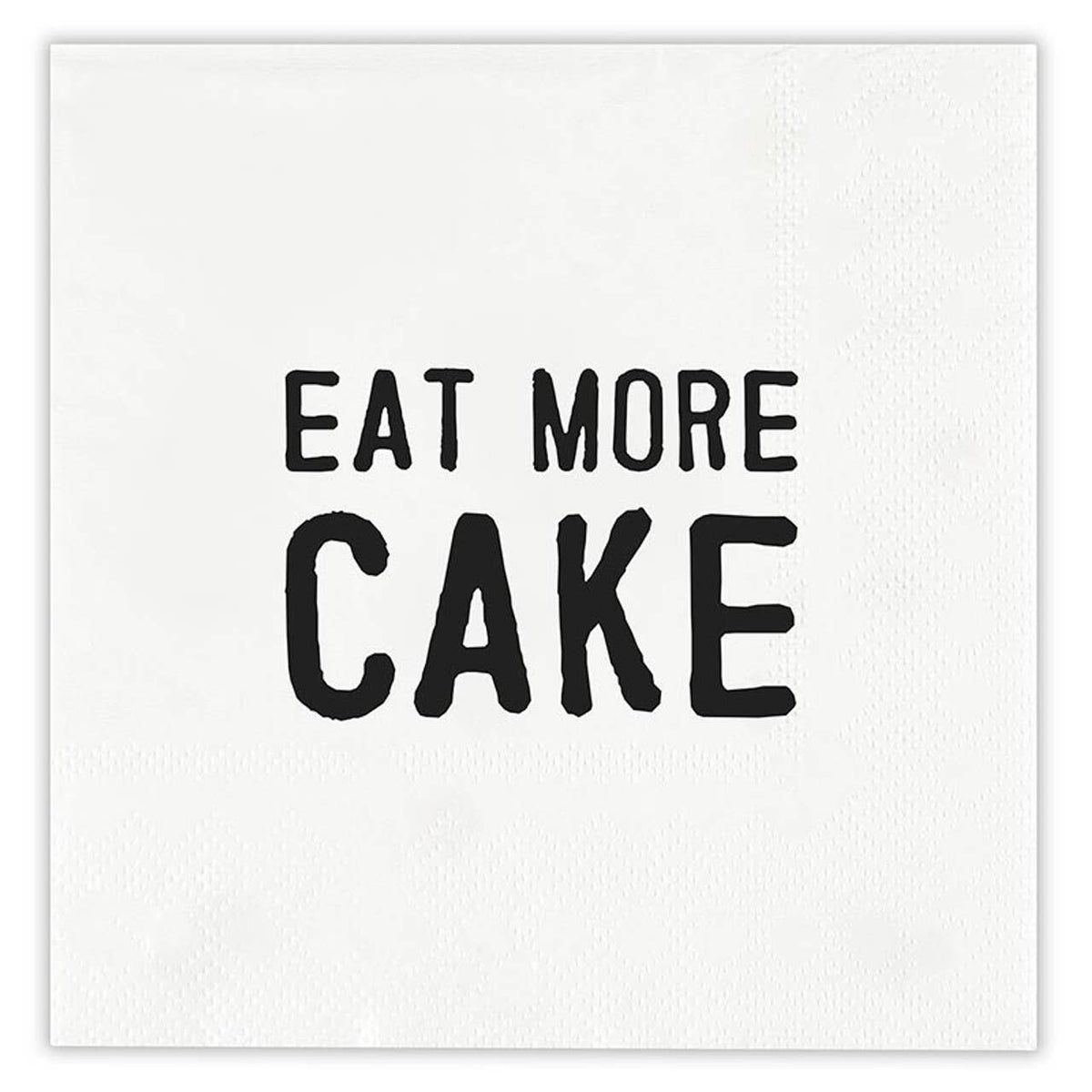 A square white paper napkin with the phrase 'EAT MORE CAKE' printed in a bold, black hand-drawn style font in the center.