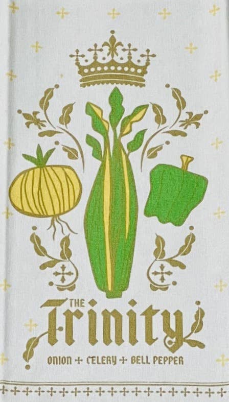 Decorative towel with illustrations of an onion, celery, and bell pepper, featuring a crown and the word 'Trinity'.