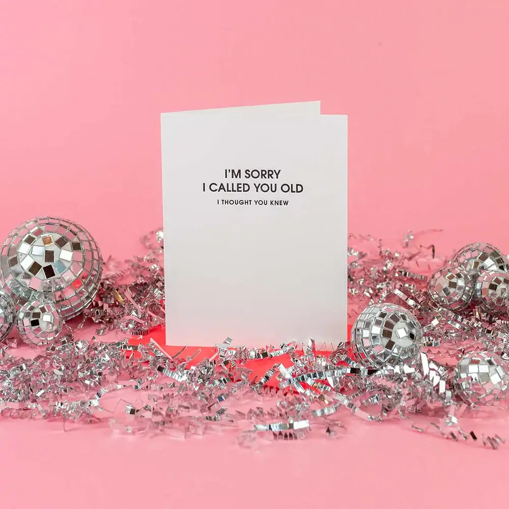 Card with humorous text on a pink background with disco balls and confetti