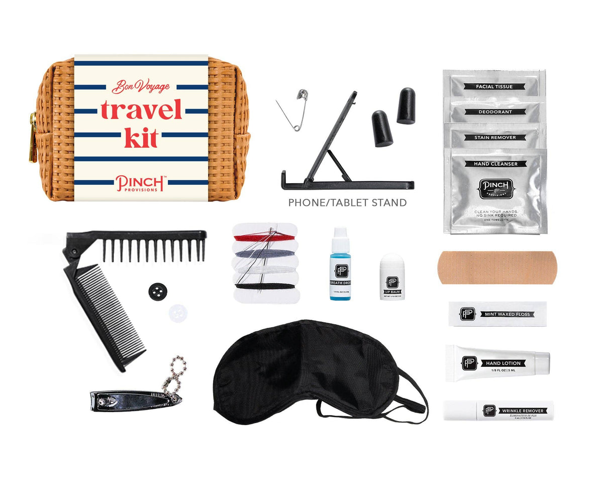 Collection of travel items including a comb, phone stand, eye mask, and toiletries on a white background.