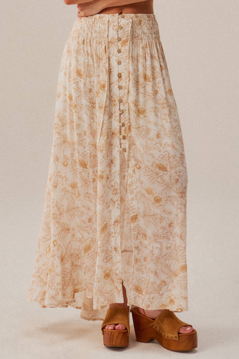 Long floral skirt with a neutral background