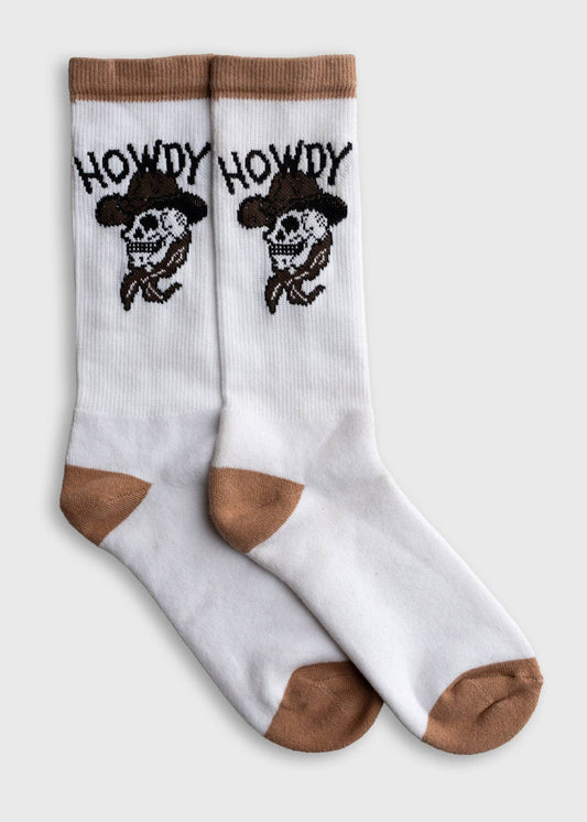 White socks with brown accents and skull designs on a white background
