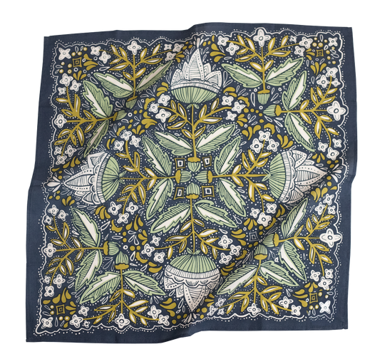 A square silk scarf featuring a detailed botanical and floral pattern in navy blue, sage green, mustard yellow, and white, shown flat against a white background.