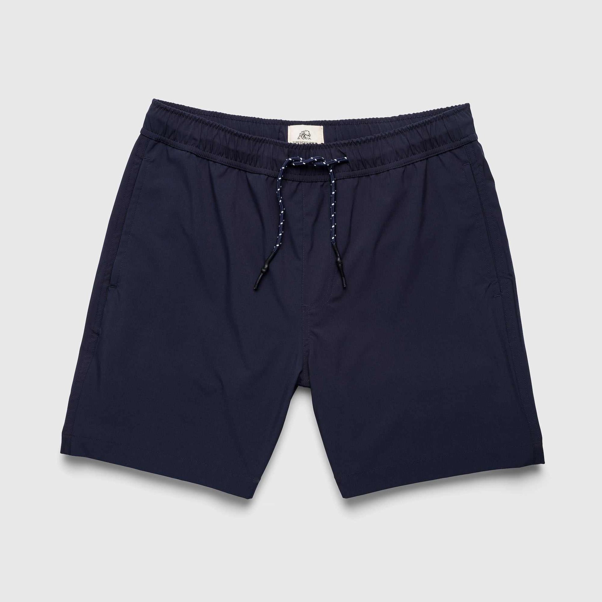 Navy blue shorts with drawstring on a light gray background